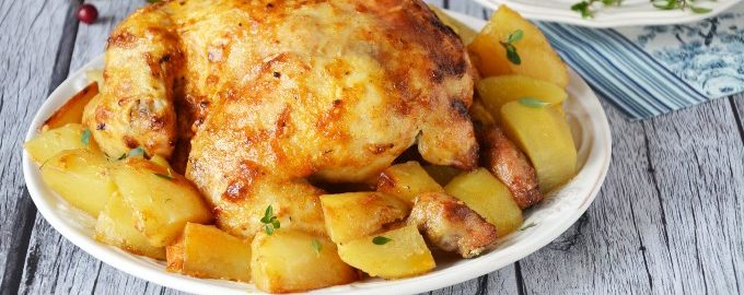 Курица в духовке целиком с картошкой